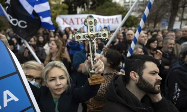 Hundreds of protesters opposed to bill allowing same-sex marriage rally in Greek capital